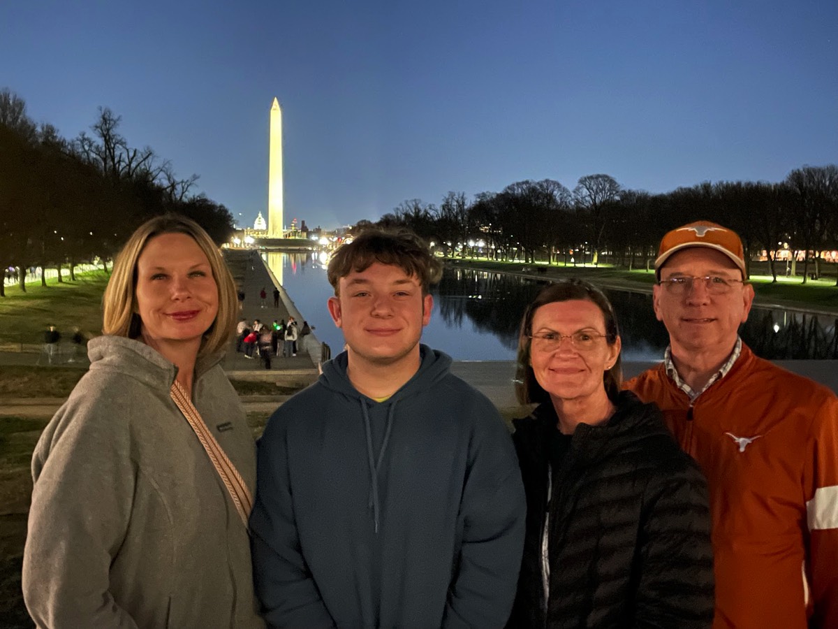 The Hyslop family from Austin, Texas  at the Reflecting Pool on a Night Tour in March 2025